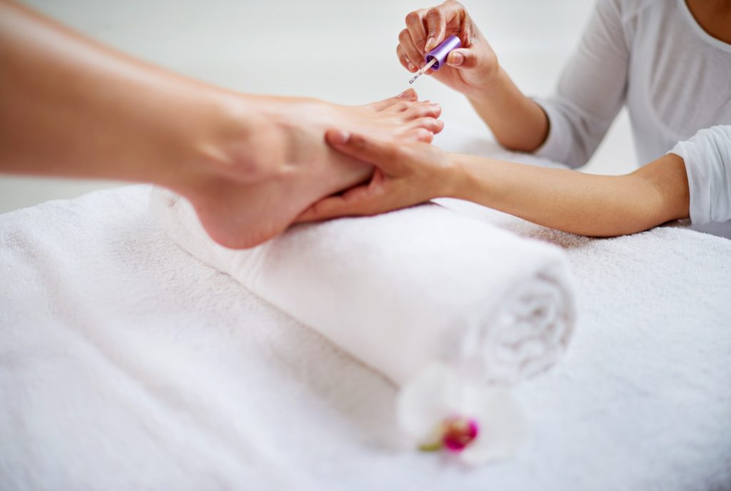 Relaxing pedicure. Closeup shot of a woman getting a pedicure in a health spa.